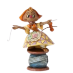 Assepoesters Helpertje:  Suzy on a spool of thread