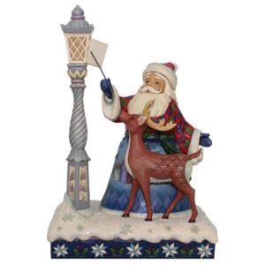Heartwood Creek Santa with lantern and reindeer illuminated