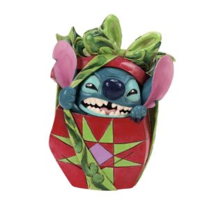 Disney Traditions Stitch tearing Christmas present