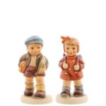 M.I. Hummel Schulmädchen & Schuljunge